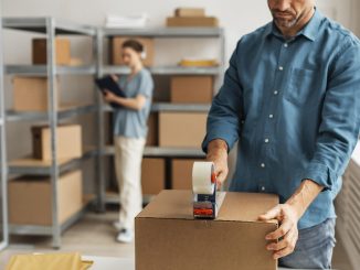a man packing a box